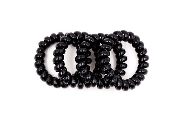 istock Black plastic elastic hair bands 1190978357