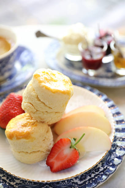istock Scones with jam and tea english baked dessert 1190980032