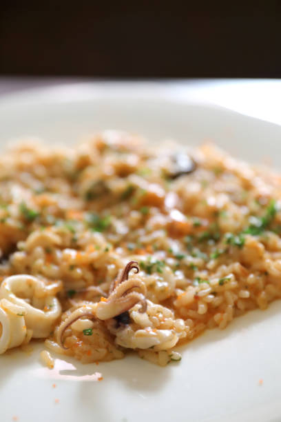 istock Seafood Risotto , traditional italian rice on table 1190980037
