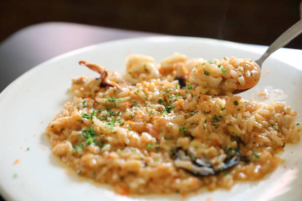 istock Seafood Risotto , traditional italian rice on table 1190980048