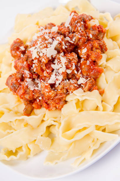 istock Reginette pasta with bolognese sauce 1190984127