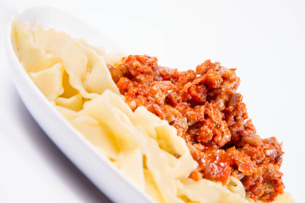 istock Reginette pasta with bolognese sauce 1190984236