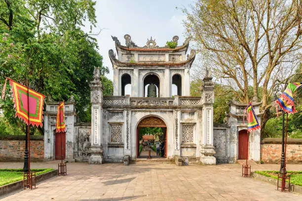 Awesome view of the main gate of the Temple of Literature in Hanoi, Vietnam. Amazing ancient architectural styles of many dynasties. The Temple of Confucius is a popular tourist destination of Asia.
