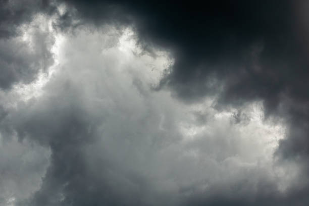 istock gray incoming storm clouds dark closeup backdrop 1190984855