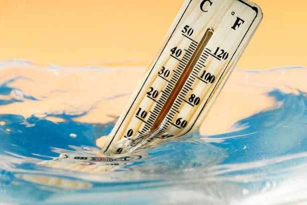 Climate Change Concept Thermometer Immersed In Water Stock Photo - Download  Image Now - iStock