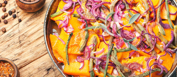 istock Baked pumpkin slices in pan 1190989435