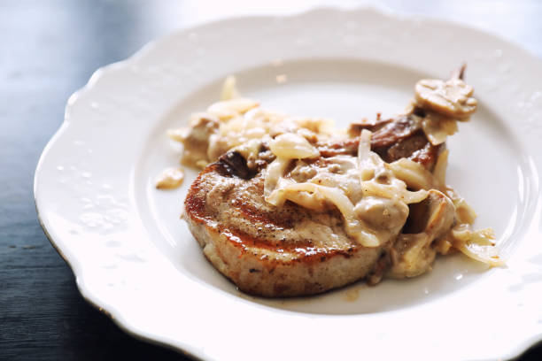 istock Pork chop with mushroom sauce 1190990294