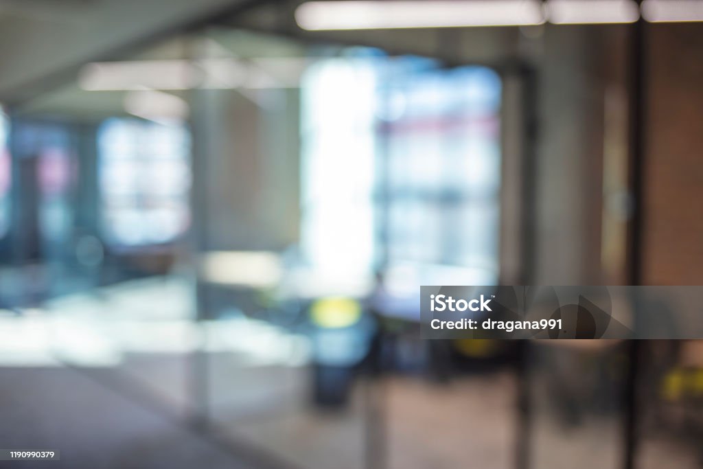 Atmosphere around office blur background with bokeh Atmosphere around office blur background with bokeh. Abstract blurred office interior room. blurry working space with defocused effect. use for background or backdrop in business concept Office Stock Photo