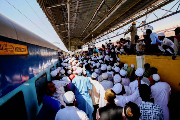 istock Muslims gathered in crowd on train stop . 1190990571