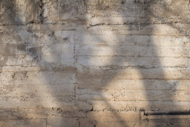 istock Old Dirt Rough Cement Wall Grunge Background 1190991346