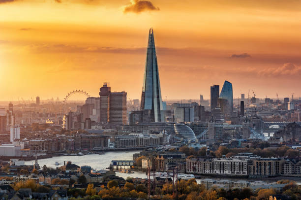 View to the modern skyline of London, United Kingdom View to the modern skyline of London, United Kingdom, in autumn during sunset time with all the popular tourist attractions central london skyline stock pictures, royalty-free photos & images