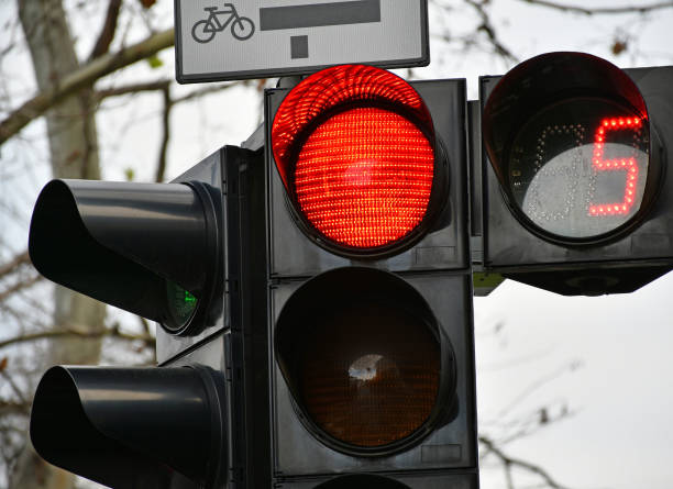 istock Red traffic light at the road crossing 1190993819