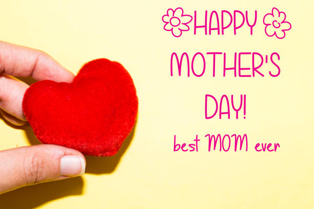 istock Mothers Day message with small red heart 1190994775