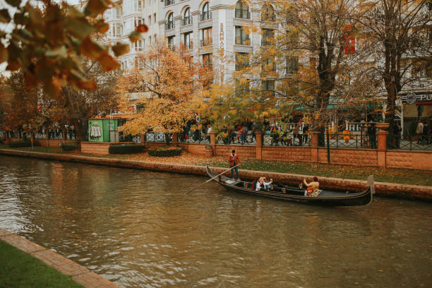 People doing gondola ride in autumn in Eskisehir Turkey People doing gondola ride in autumn in Eskisehir eskisehir stock pictures, royalty-free photos & images