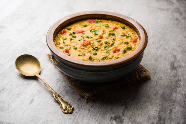 istock Vegetable masala oats khichadi served in a bowl. selective focus 1191000897