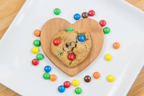 Delicious homemade sweet cookies with colorful chocolate sweets