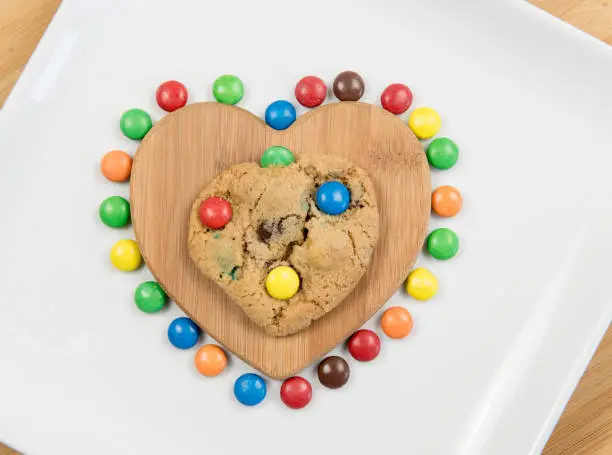 Delicious homemade sweet cookies with colorful chocolate sweets