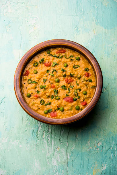 istock Vegetable masala oats khichadi served in a bowl. selective focus 1191001190