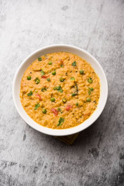 istock Vegetable masala oats khichadi served in a bowl. selective focus 1191001234