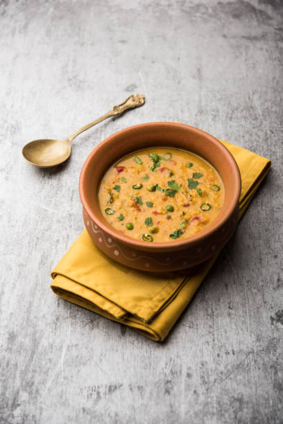 istock Vegetable masala oats khichadi served in a bowl. selective focus 1191001798