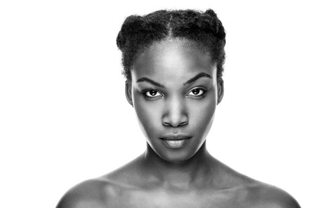 Face of an young black beauty in black and white