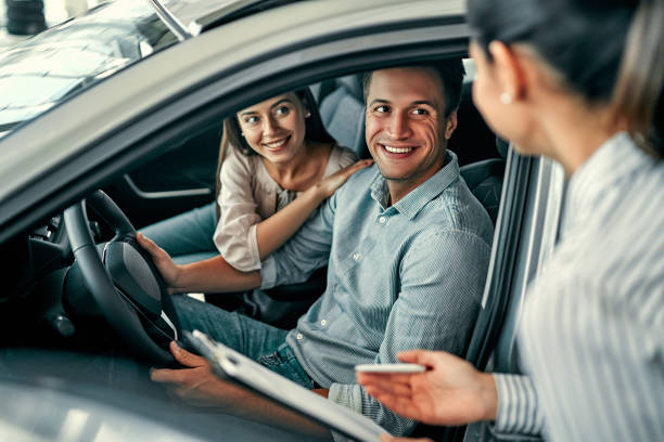 istock Visiting car dealership. 1191003575