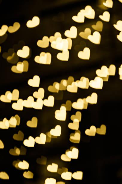 istock Golden heart bokeh background 1191005363