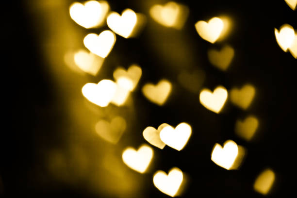 istock Golden heart bokeh background 1191005364