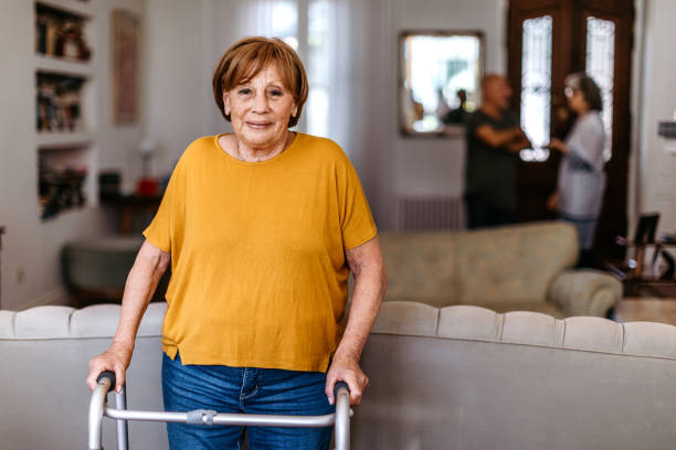 istock Senior woman with walking disability 1191006477