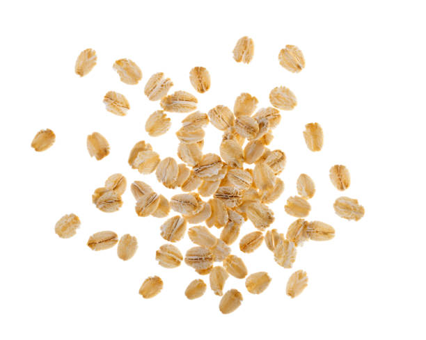 istock Rolled oats, healthy breakfast cereal oat flakes isolated on white top view 1191013164
