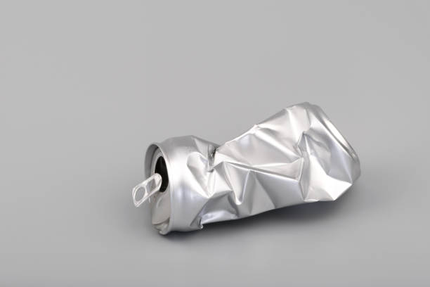 istock Crumpled empty blank soda or beer can garbage. Crushed junk can recycle 1191013929