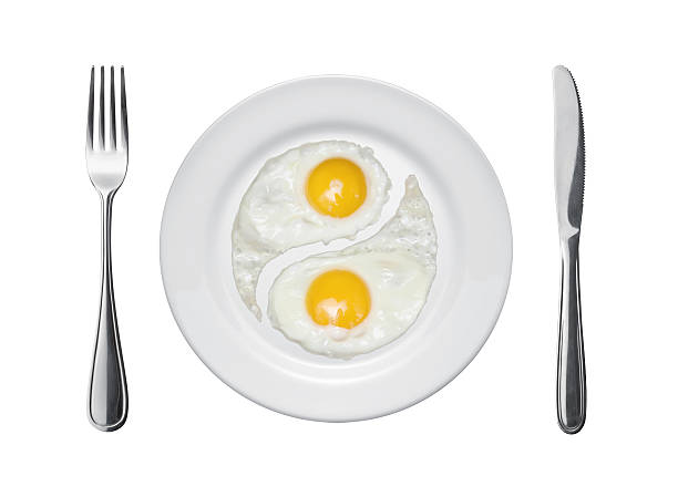 istock Fried eggs in the form of yin and yang 119101542