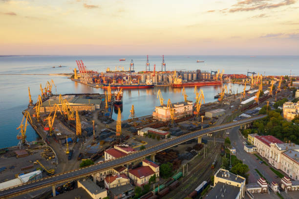 istock Cargo crane, ship and grain dryer in port Odessa, 1191015447