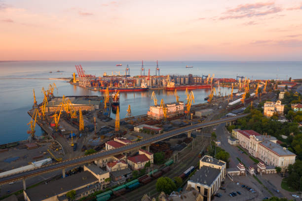 istock Cargo crane, ship and grain dryer in port Odessa, 1191015449