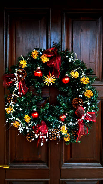 istock Front Door with Christmas Wreath 1191016290