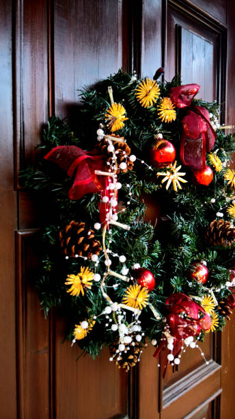 istock Front Door with Christmas Wreath 1191016291