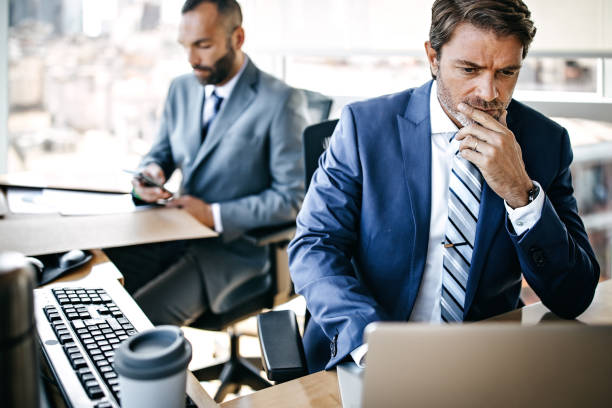 istock Businessman working on office laptop 1191020109