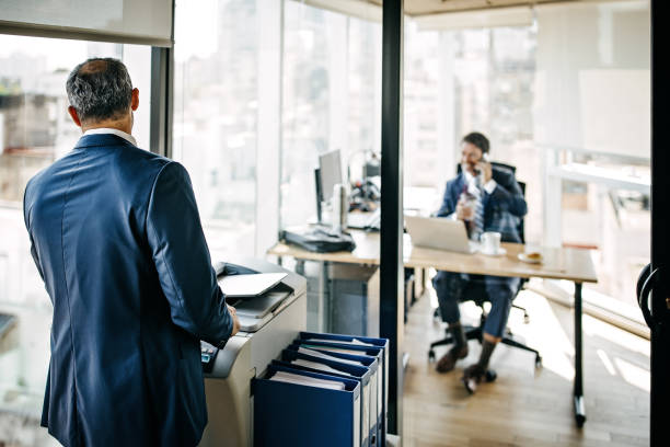 Two businessmen working at office