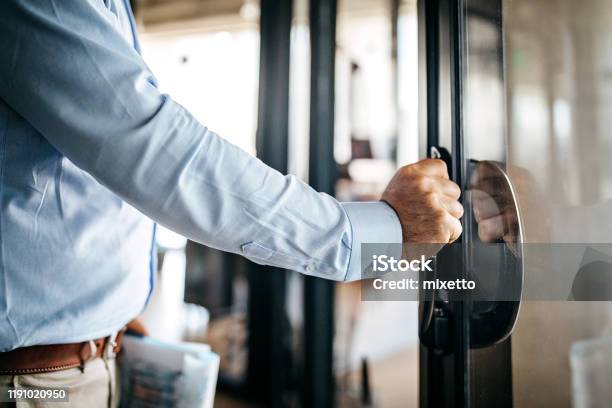 Businessman Entering Office Cabin Stock Photo - Download Image Now - Door, Office, Leaving