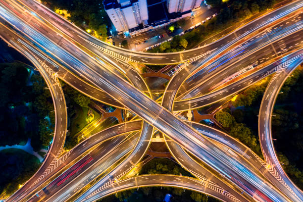 istock Urban highway traffic shanghai at night 1191026926