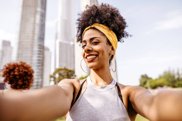 istock Woman having fun taking selfie 1191028559