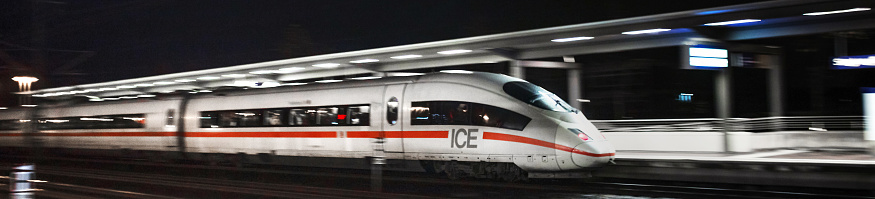 siegburg, North Rhine-Westphalia/germany - 28 11 19: ICE train passing siegburg germany at night panorama