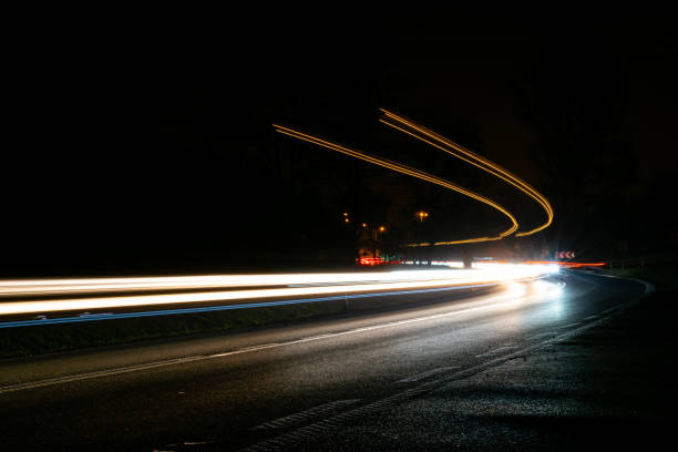 istock lights of cars with night 1191031237