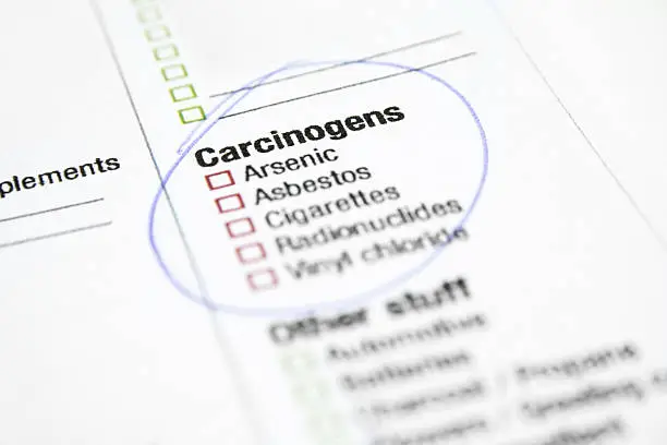 Photo of Carcinogen substances with a list circled on a paper form