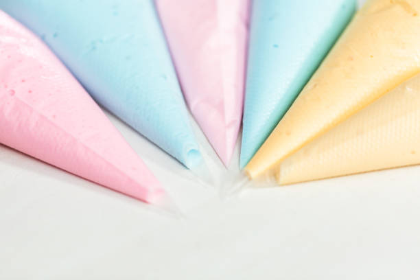 istock Piping bags with pastel color royal icing 1191035972
