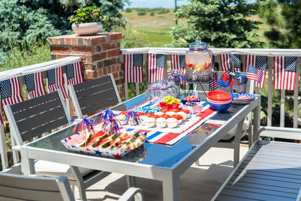 istock Table with food and drinks set for celebrating July 4th 1191036219