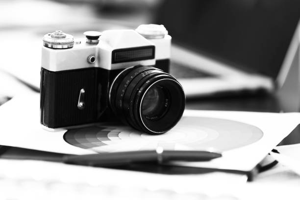 istock close up.camera on the table at the designer 1191036457