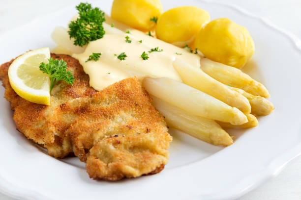 istock cutlet with asparagus and potatoes 1191039551