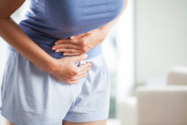 istock Woman with menstrual pain 1191043745