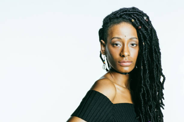 istock African American woman with dreadlocks looking at the camera 1191043894